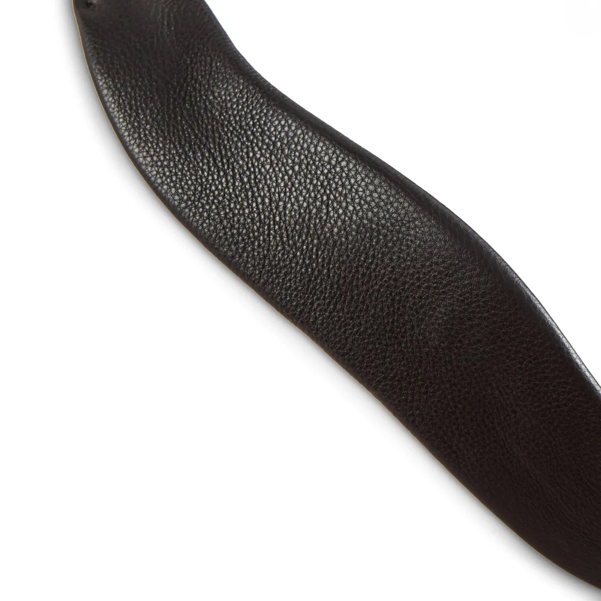 Detailed close-up of the supple, grain-textured black leather padding on an EcoRider SeamFree anatomic bridle component.