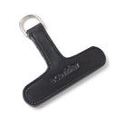 Black EcoRider Crupper T Leather Attachment showing the T-bar shape, debossed brand name, and stainless steel D-ring.