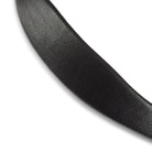 Detailed view of the premium pebbled grain black leather and soft padding on an EcoRider Ultra Comfort bridle component.