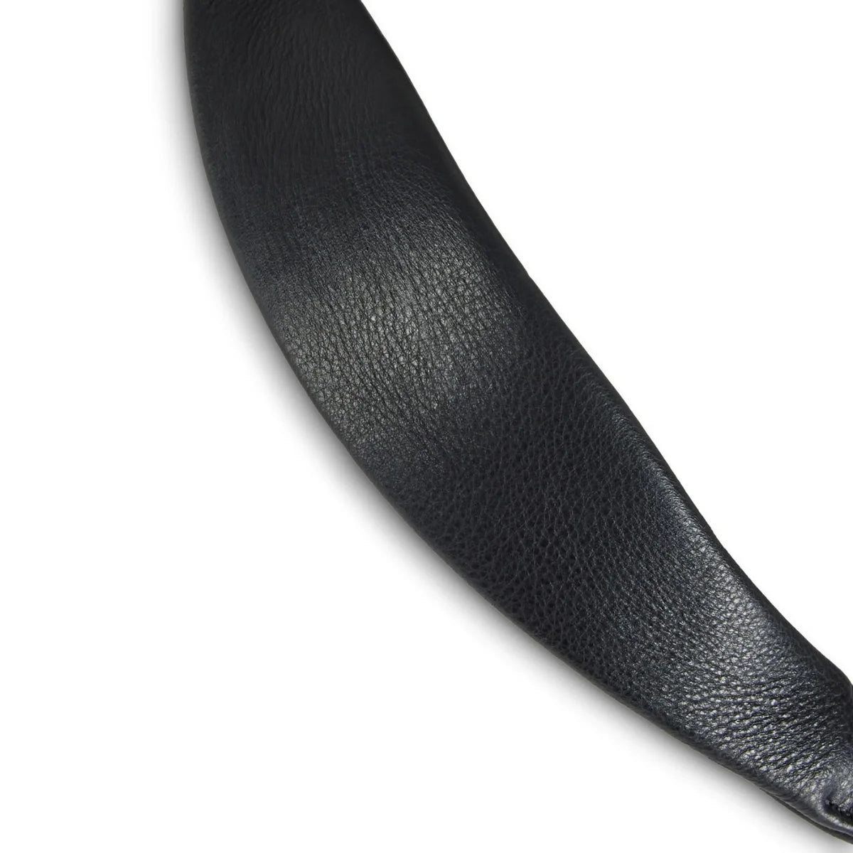 Close-up view of the supple, grain-textured black leather on an EcoRider Ultra Comfort padded bridle component.