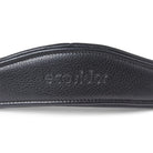 Close-up of the debossed EcoRider brand name on a black padded leather anatomical headpiece, showing detailed stitching.