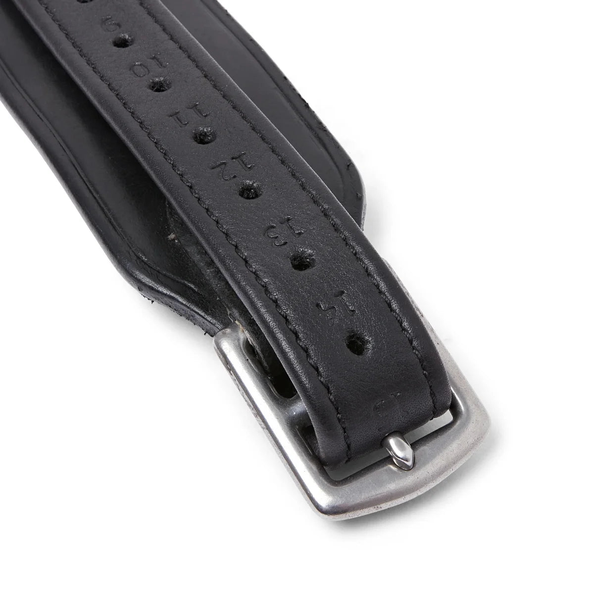 Close-up of the stainless steel buckle and numbered holes on the Black EcoRider Balance Stirrup Leathers.