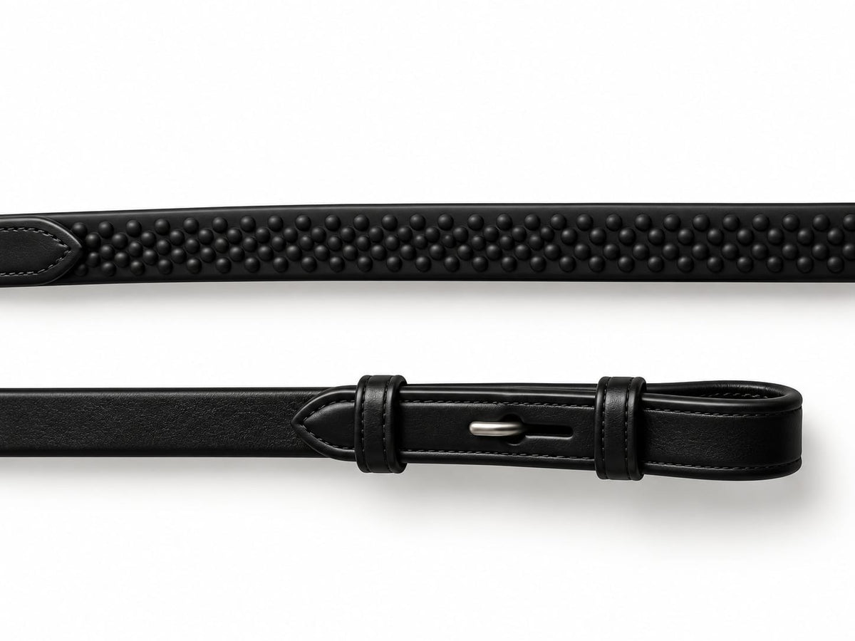 Coiled Black EcoRider Ultra Comfort Flexi Reins featuring a low-profile pimple rubber grip and supple leather hook stud ends.